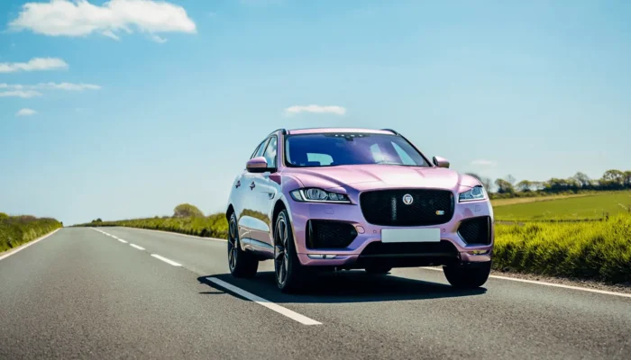 Jaguar F-Pace driving along the road in the United Kingdom
