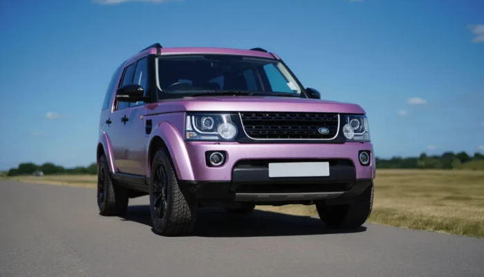 Purple Land Rover Discovery in the UK with warm weather