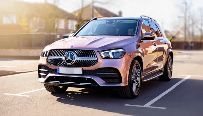 Mercedes SUV in a UK car park on a sunny day